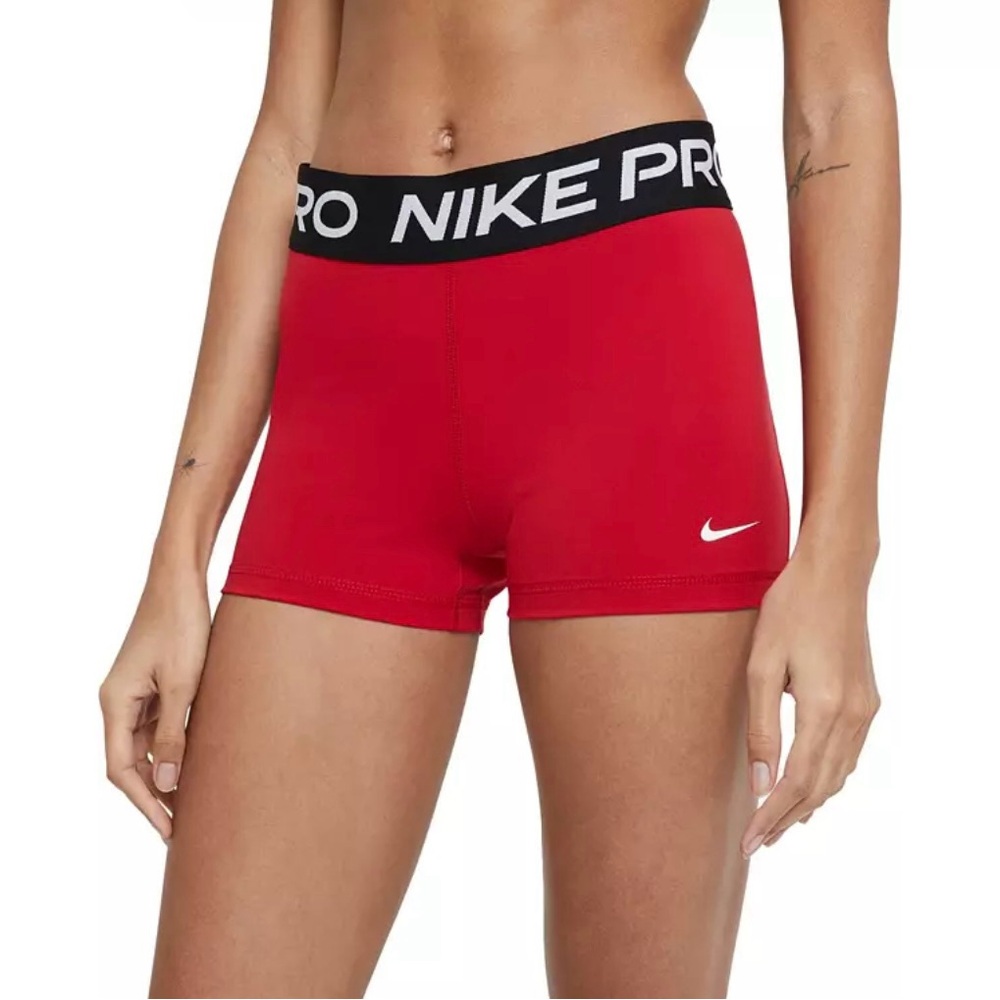 Lightly used Medium sized Nike Pros in the color red.